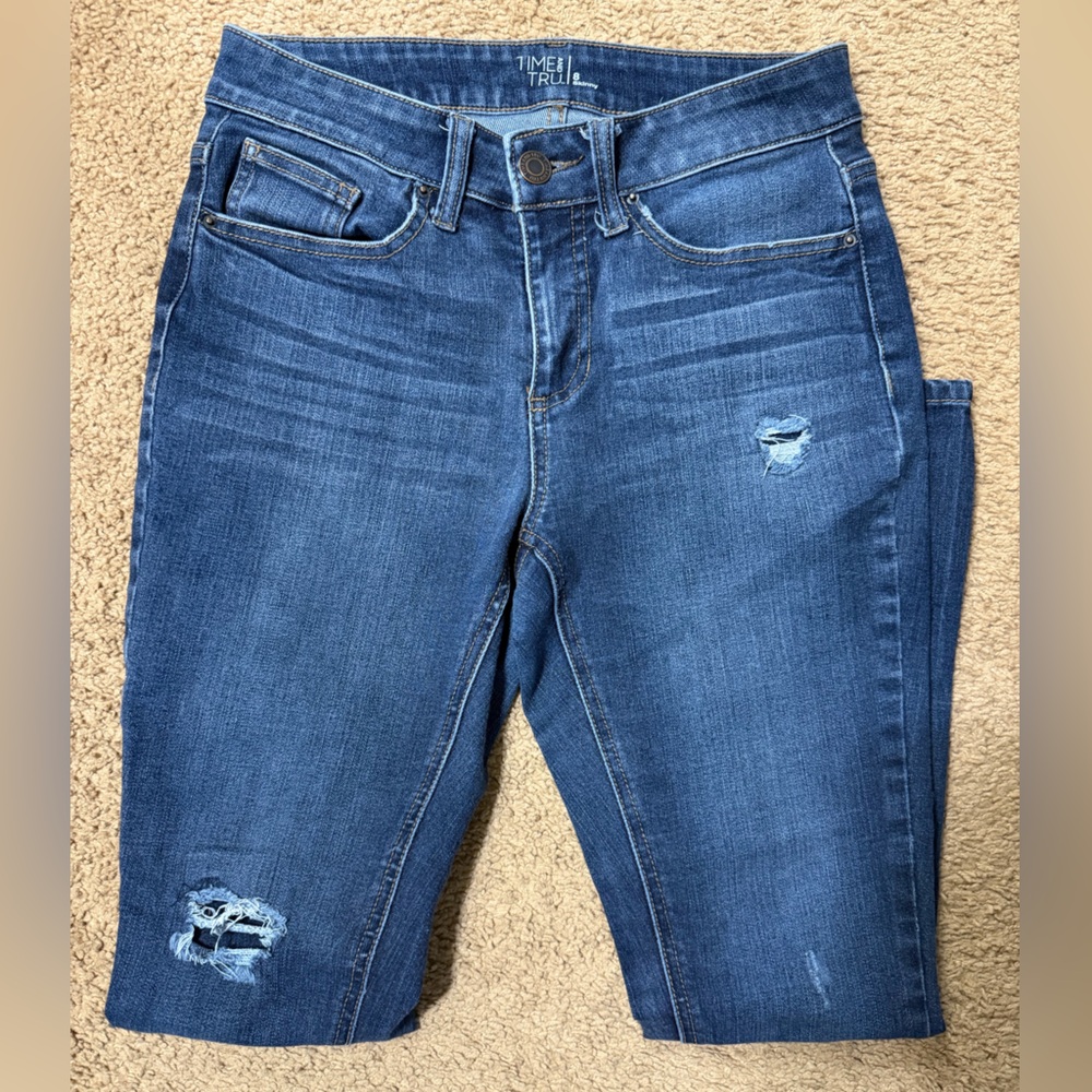 Distressed Blue Jeans